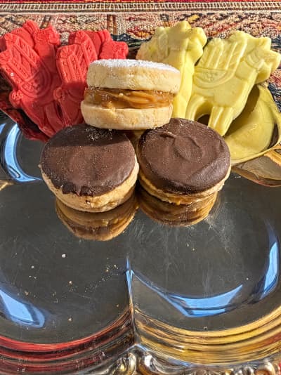 Alfajores served with llama-shaped treats