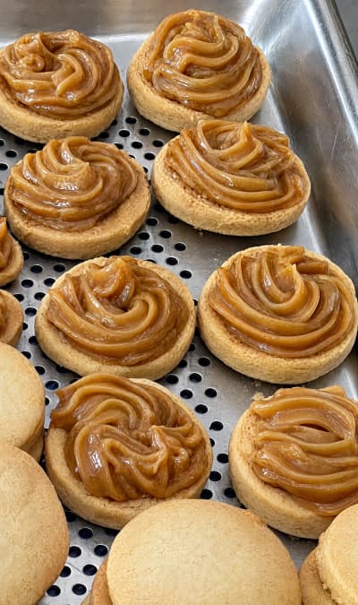 Close-up batch of alfajores with dulce de leche
